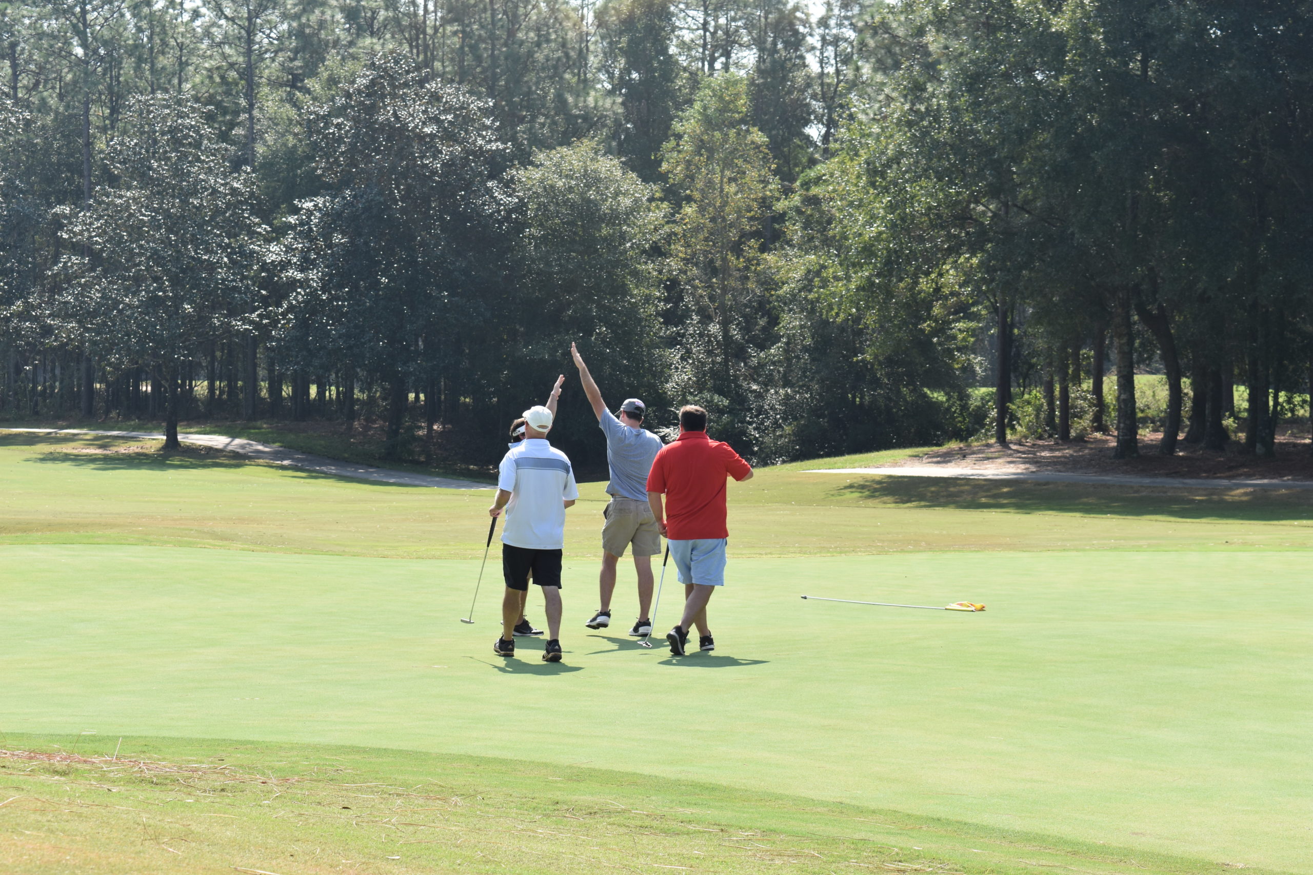 Golf Team Celebrates a put for Birdie as they participate in the 2019 Threaded Fasteners Charitable Foundation Weekend
