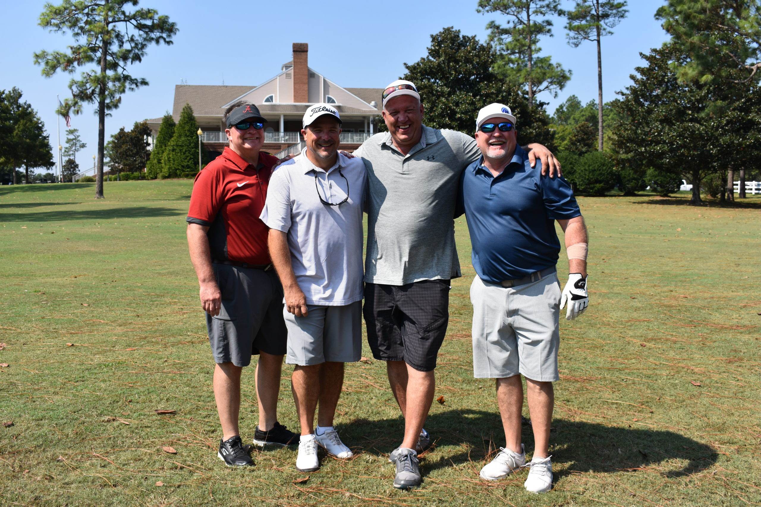 Threaded Fasteners 2019 Golf Tournament Team Members Smile for a Picture