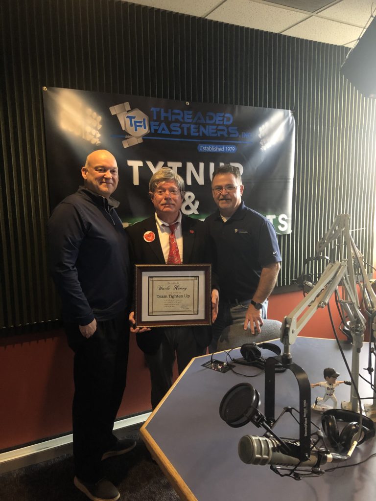 Randy Kennedy, Uncle Henry, and Billy Duren take a picture in the IHeart Radio Sports Talk 99.5 Studio